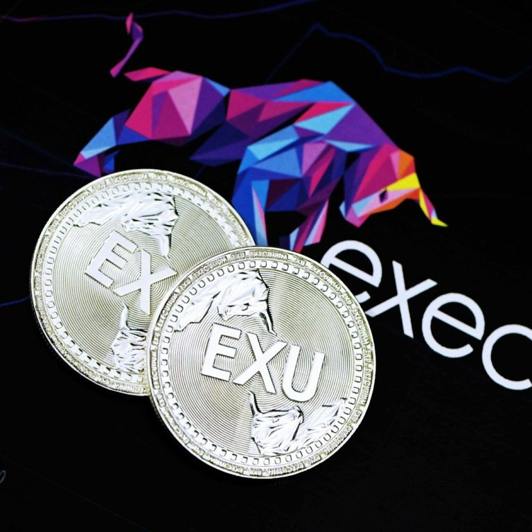 Silberankauf Zwei silberne Münzen mit der Aufschrift "EXU" auf einem bunten Hintergrund.